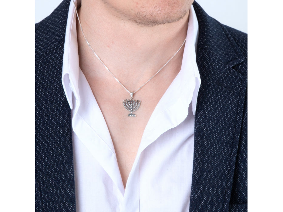Menorah pendant with the word ‘Jerusalem’ creatively formed above.